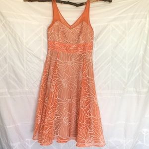 Embroidered floral dress with sheer sweetheart.